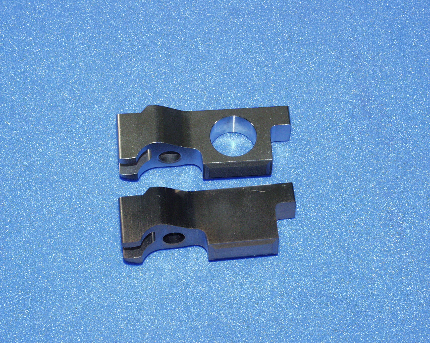 Green machining of clamps and nozzle holders